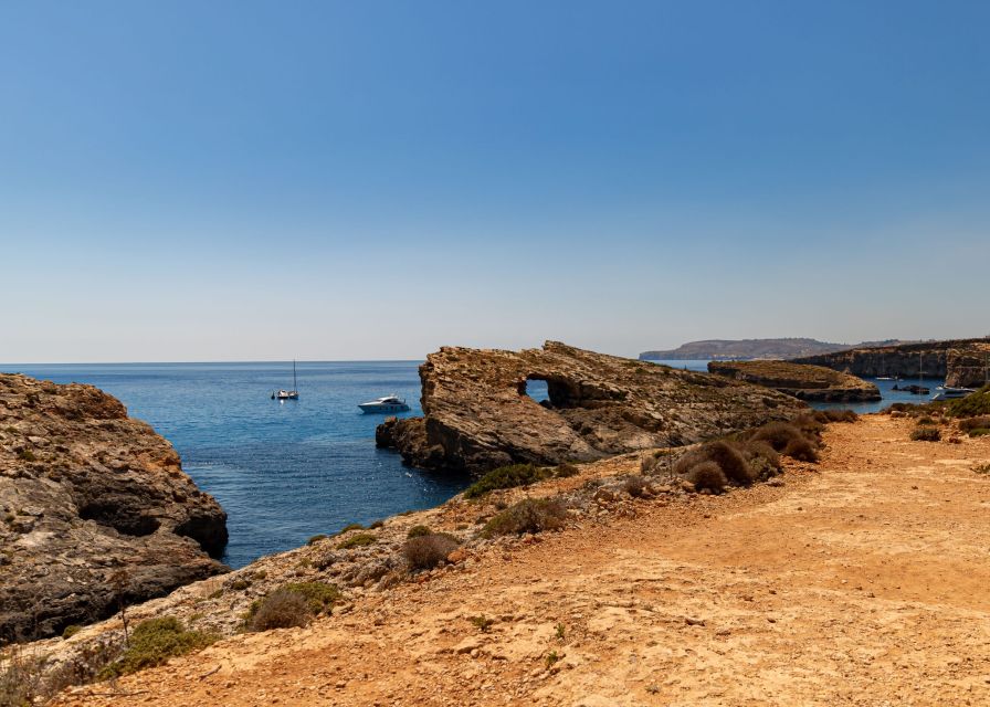 St Paul's Bay: Comino, Blue Lagoon, Gozo, & Caves Boat Tour - Santa Maria Caves and Elephant Rock from the water