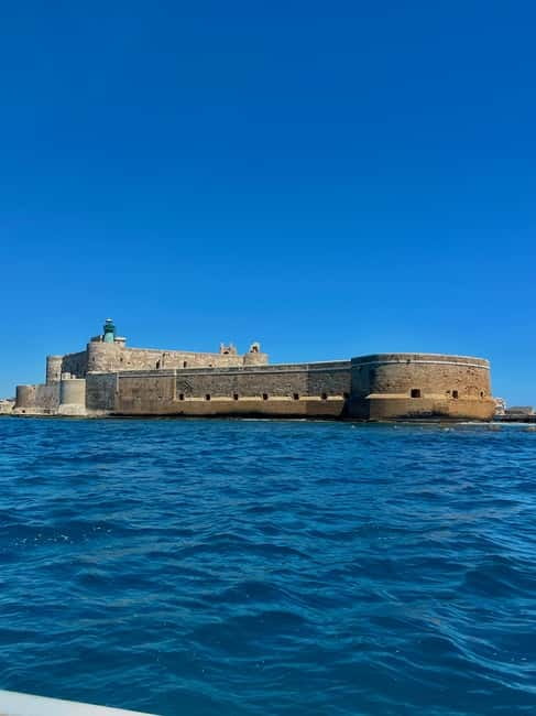 Syracuse: Ortigia Island & Sea Cave Boat Tour with Prosecco - Along the Alfeo waterfront to Maniace Castle