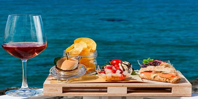 Taormina: Boat Tour with Aperitif on Isola Bella - Prosecco, almond treats, and music on the return