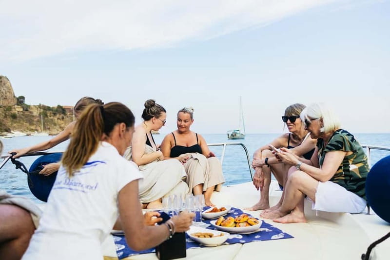 Taormina: Sunset Boat Tour with Dolphin Watching & Aperitif - The caves near Cape Taormina