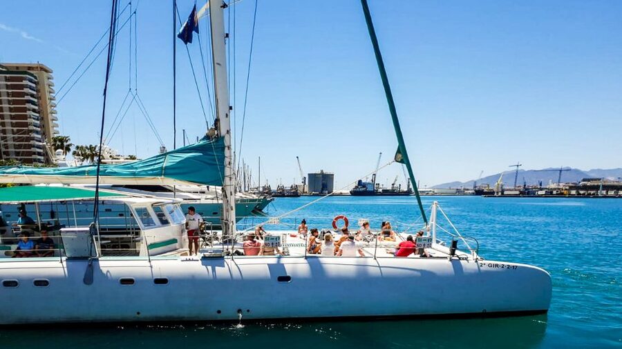 Valencia: Sailing Catamaran with Swimming & Optional DJ - Sunbathing on the catamaran’s nets