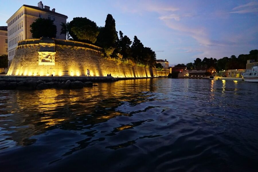 Zadar: Sunset and Night Cruise with Unlimited Sparkling Wine - Zadar Bridge and the lights of Jazine